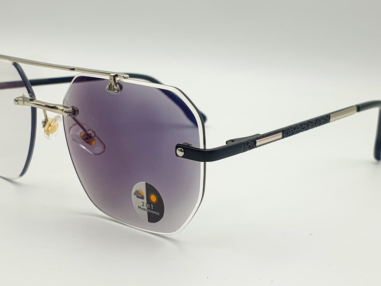 Transition Grey ā Rimless Sunglasses