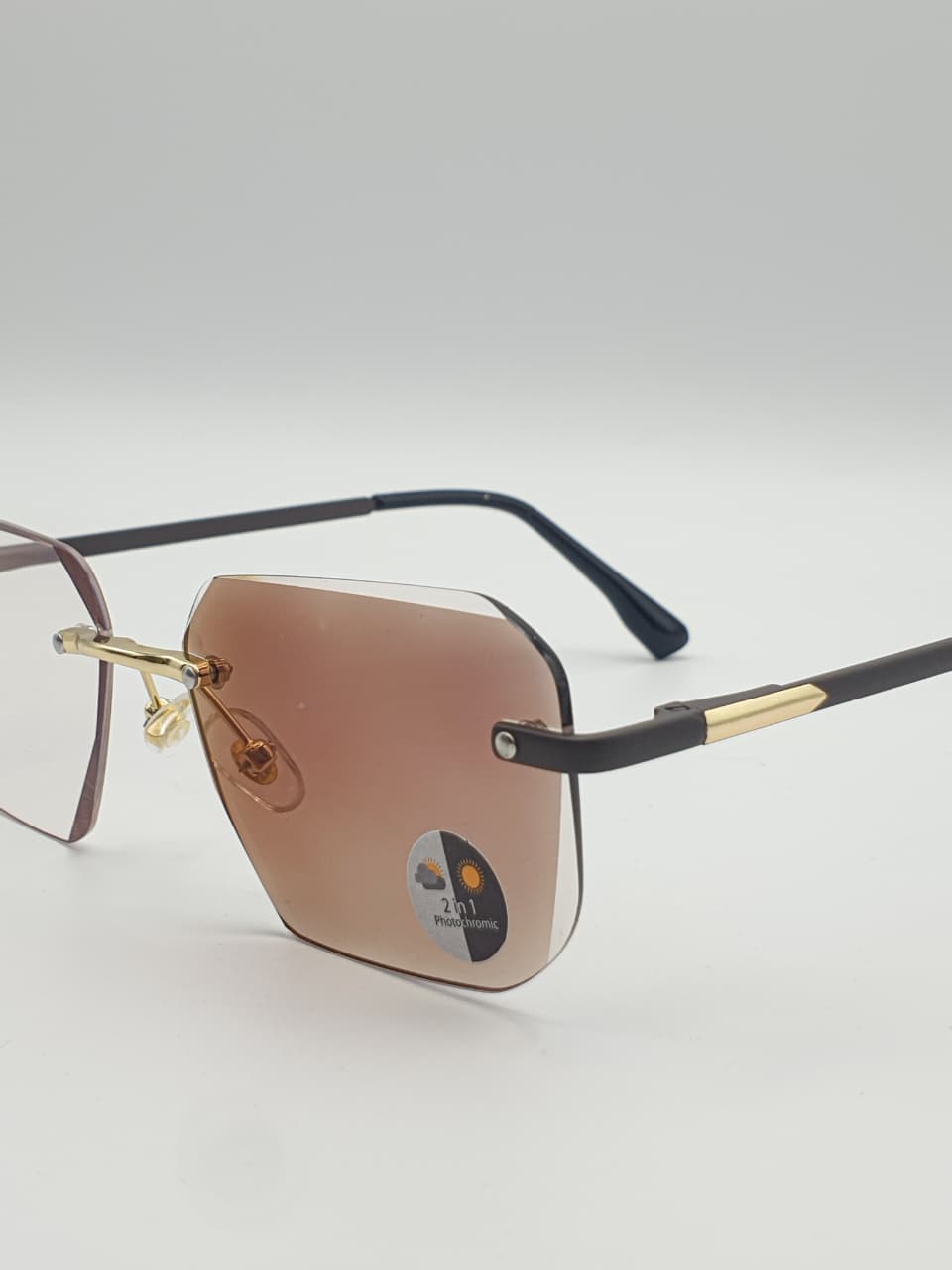 Transition Grey ā Rimless Sunglasses